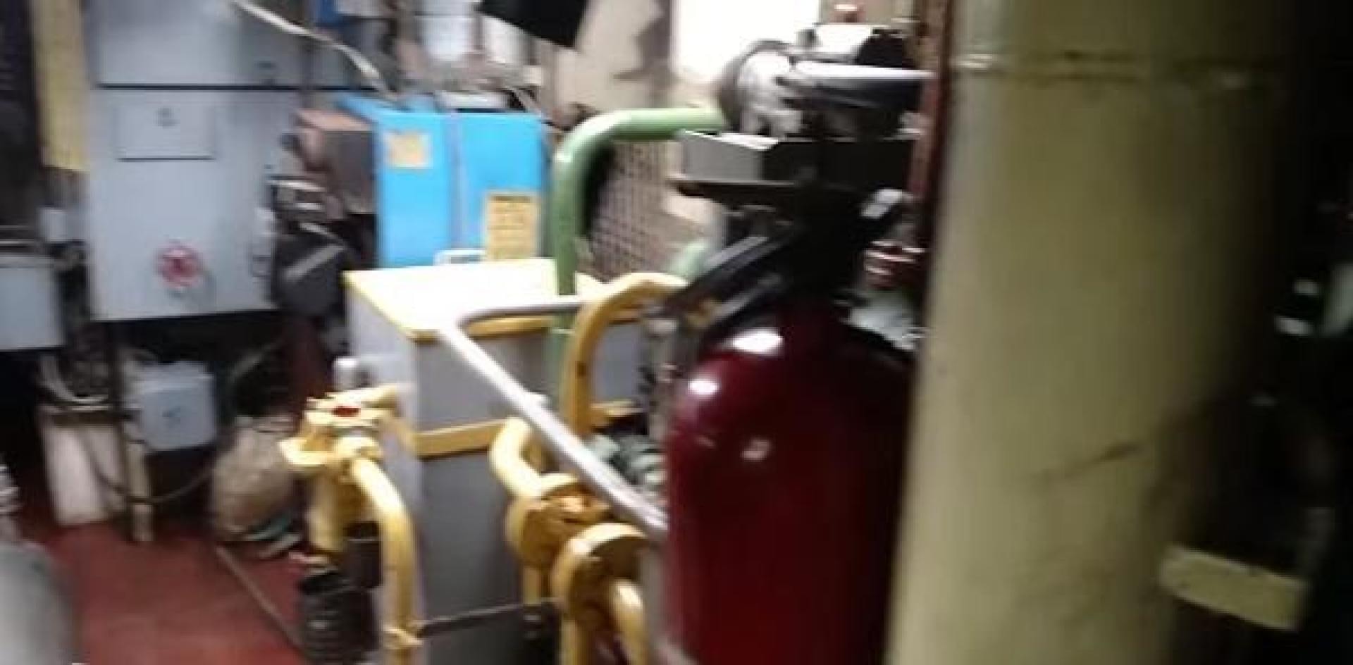 a machine in a room aboard WANDERBIRD Yacht for Sale