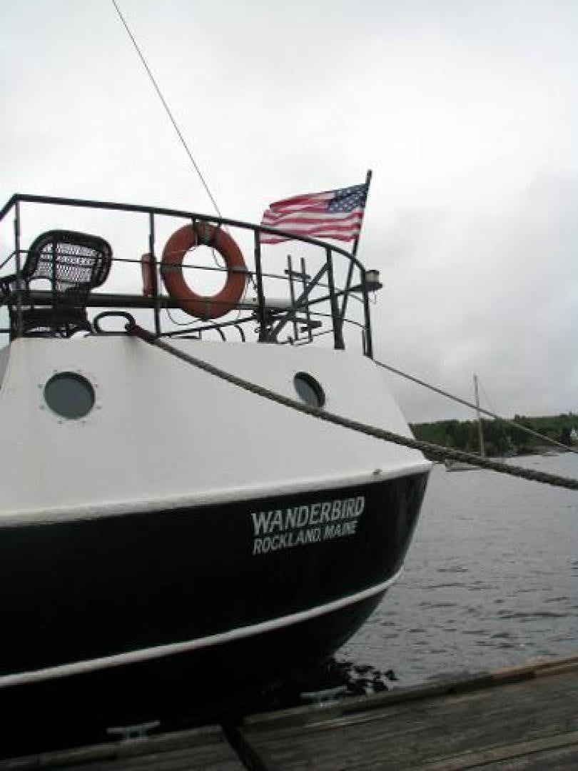 a boat on the water aboard WANDERBIRD Yacht for Sale
