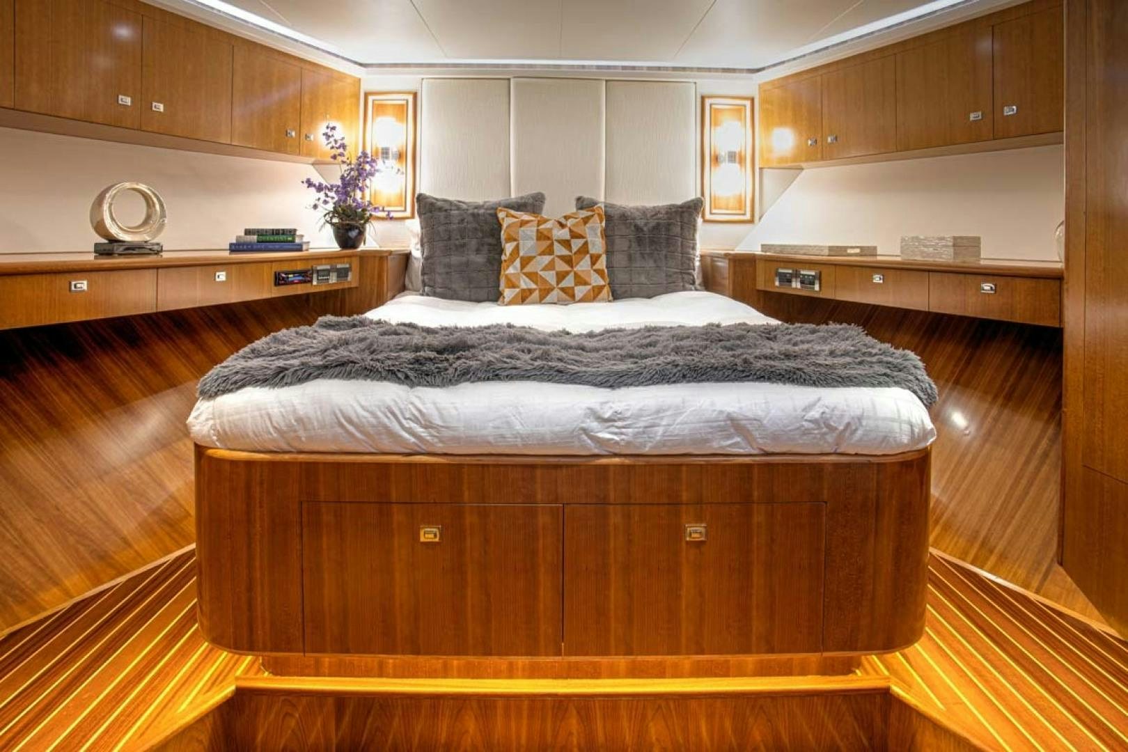 a large bed in a room aboard LORETTA Yacht for Sale