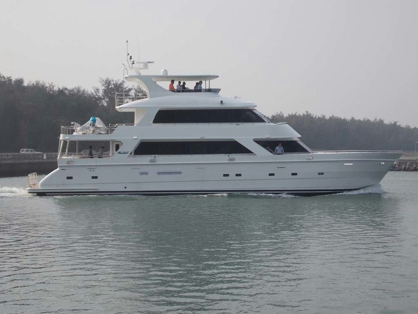 a white yacht on the water aboard LORETTA Yacht for Sale