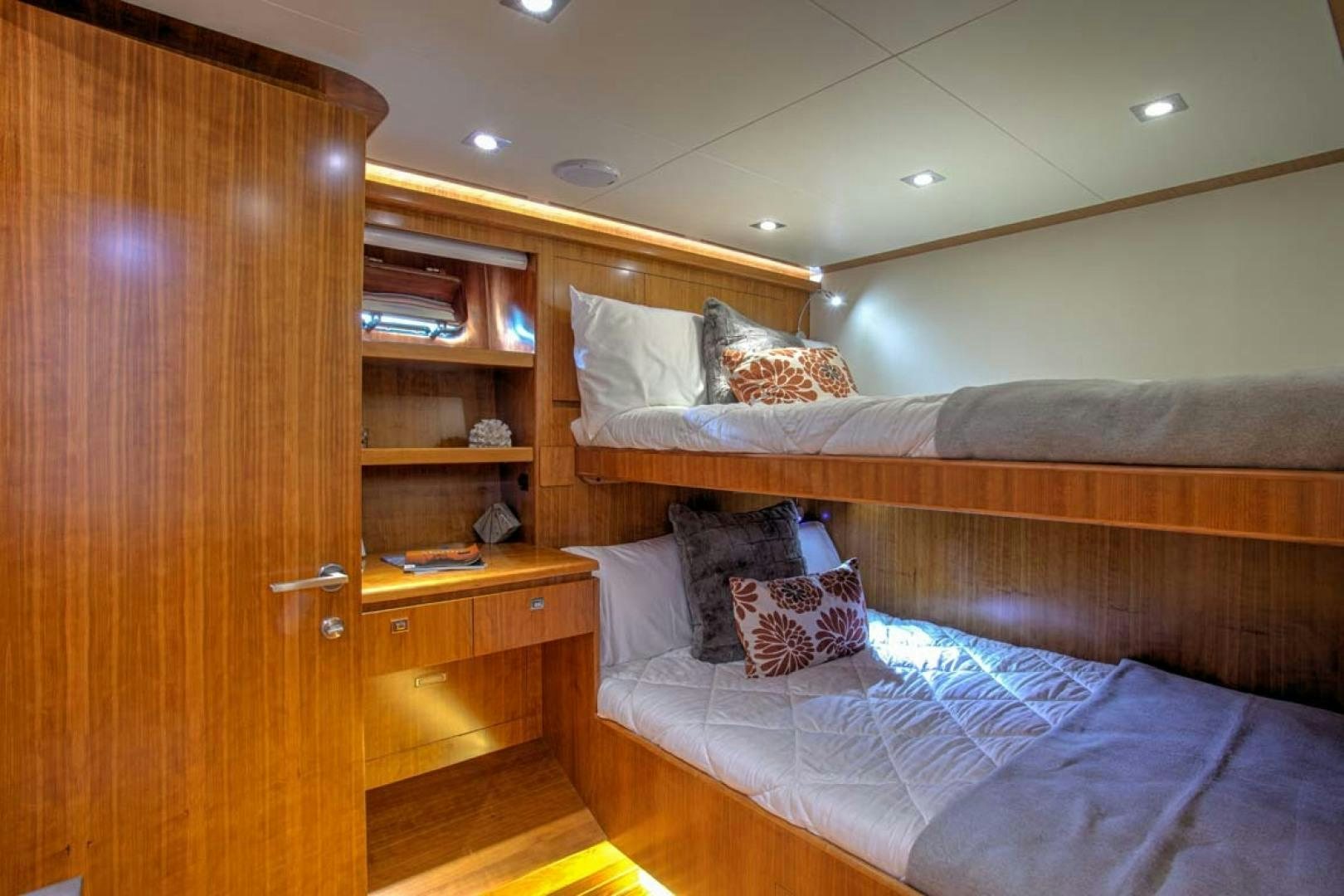 a room with a bed and a closet aboard LORETTA Yacht for Sale