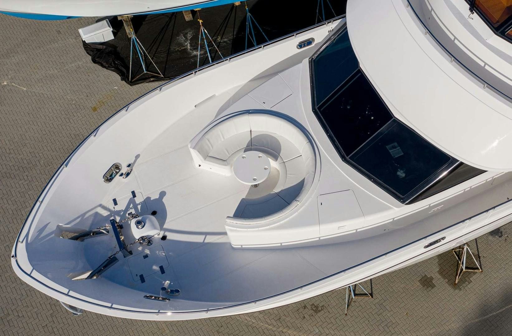 a white car with a steering wheel aboard LORETTA Yacht for Sale