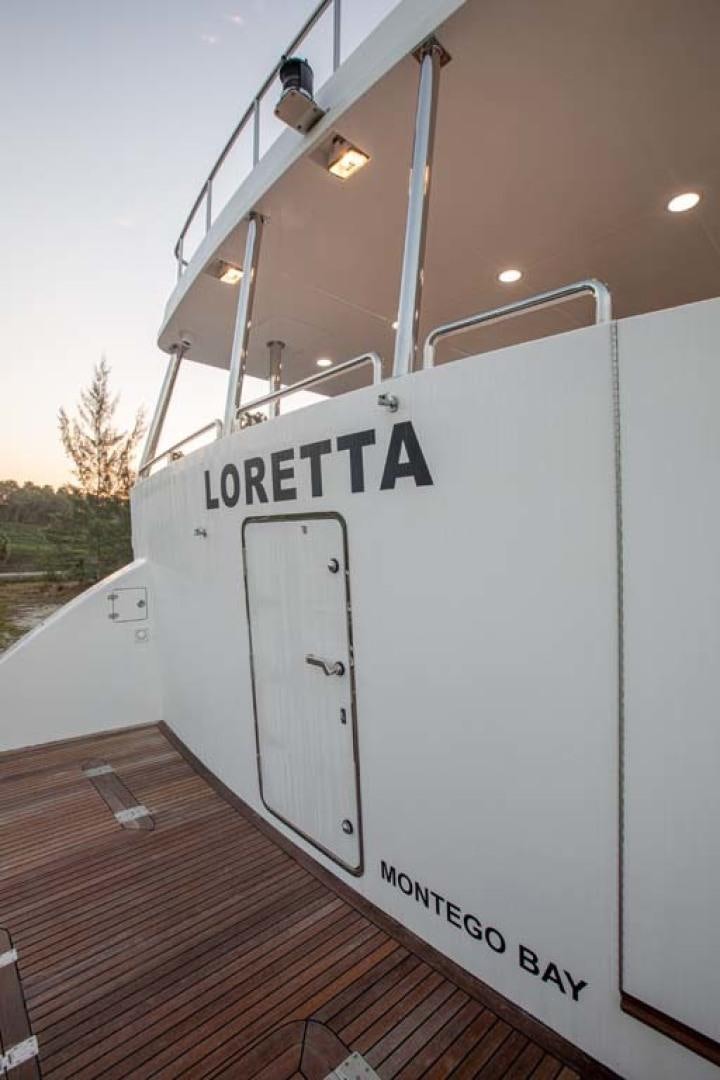 a white box with a black and white sign on it aboard LORETTA Yacht for Sale