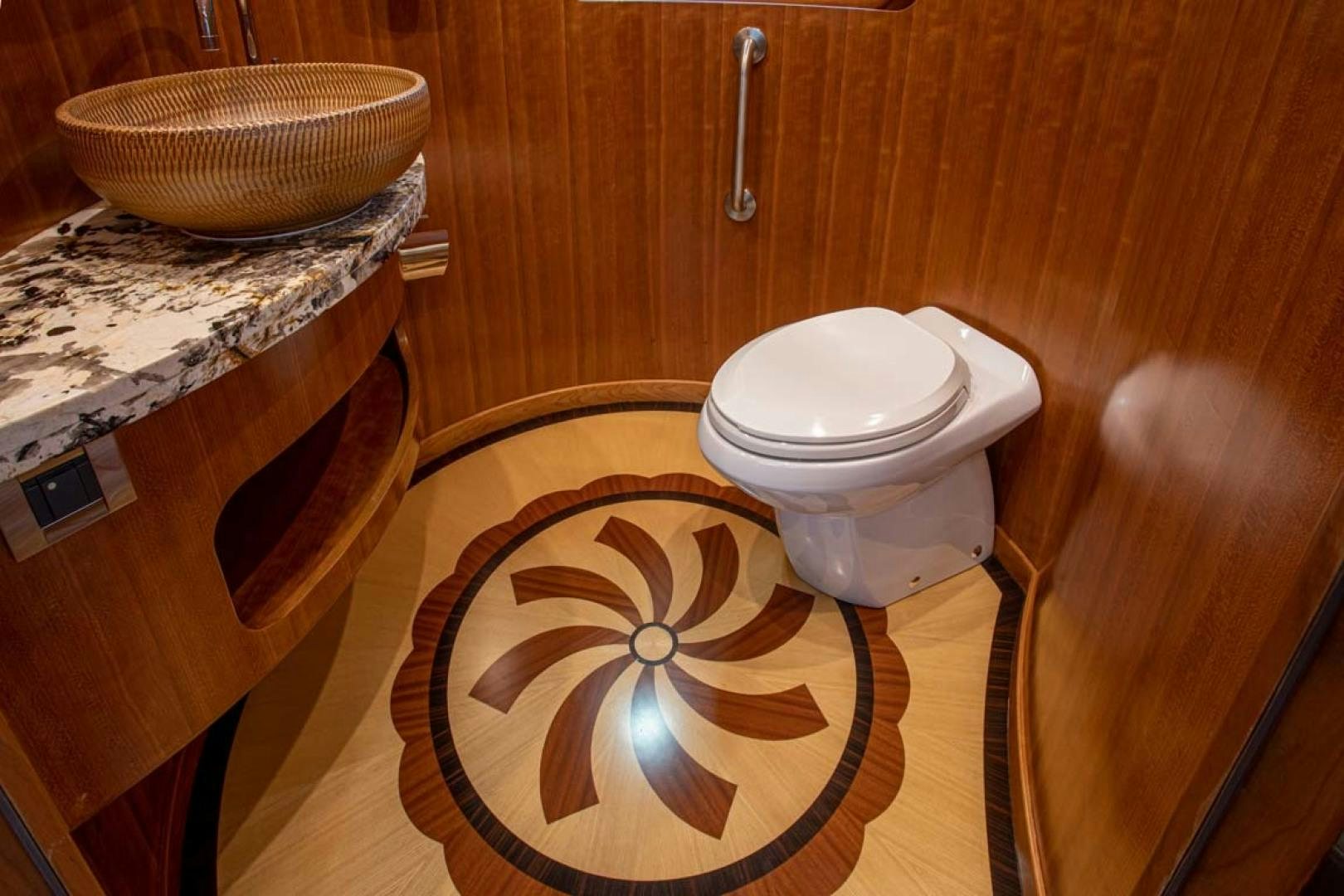 a toilet and a bowl of food aboard LORETTA Yacht for Sale