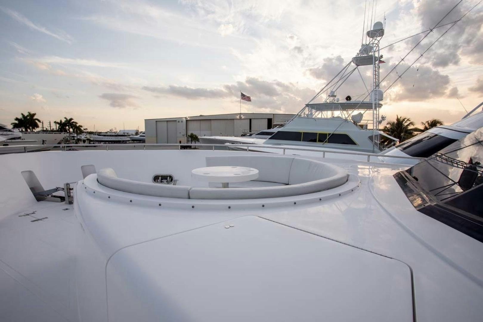 a white boat in a large body of water aboard LORETTA Yacht for Sale