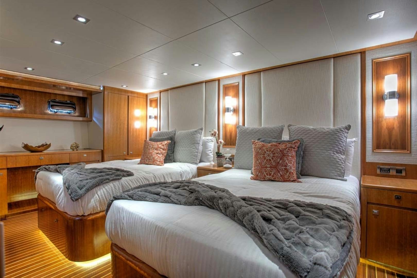 a room with a bed and a desk aboard LORETTA Yacht for Sale
