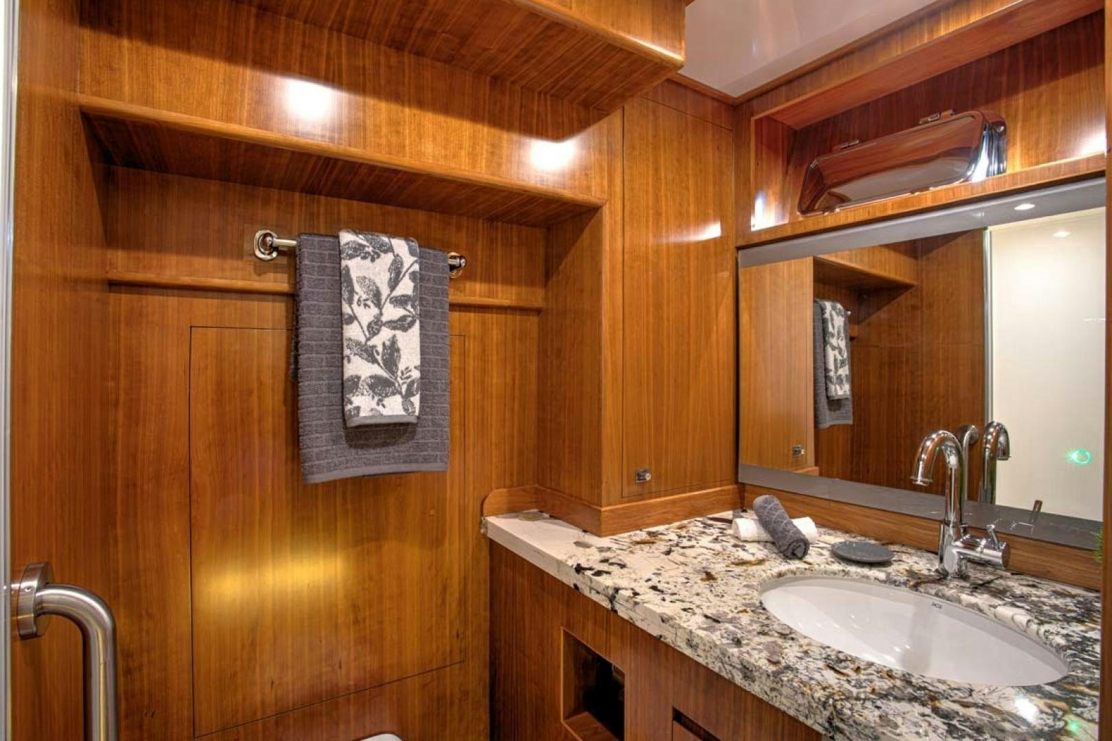 a bathroom with a towel on the wall aboard LORETTA Yacht for Sale