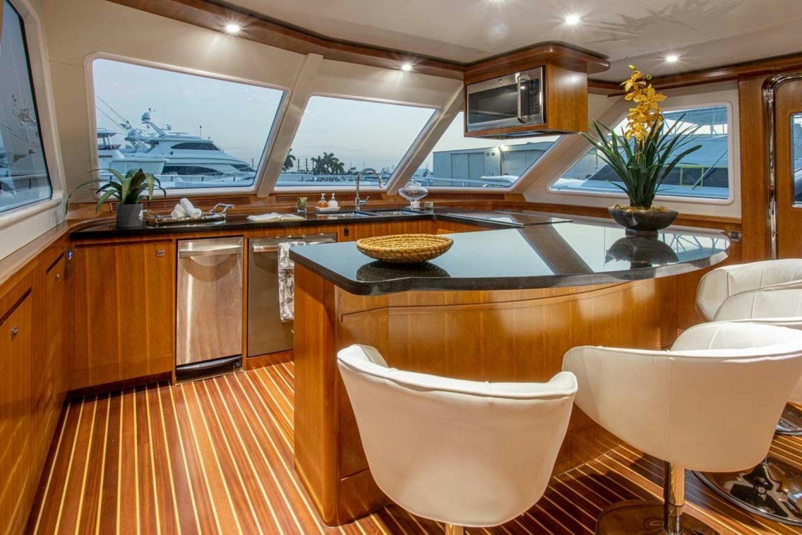 a kitchen with a large island aboard LORETTA Yacht for Sale