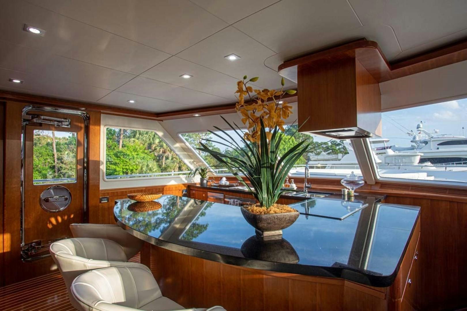 a kitchen with a large island aboard LORETTA Yacht for Sale