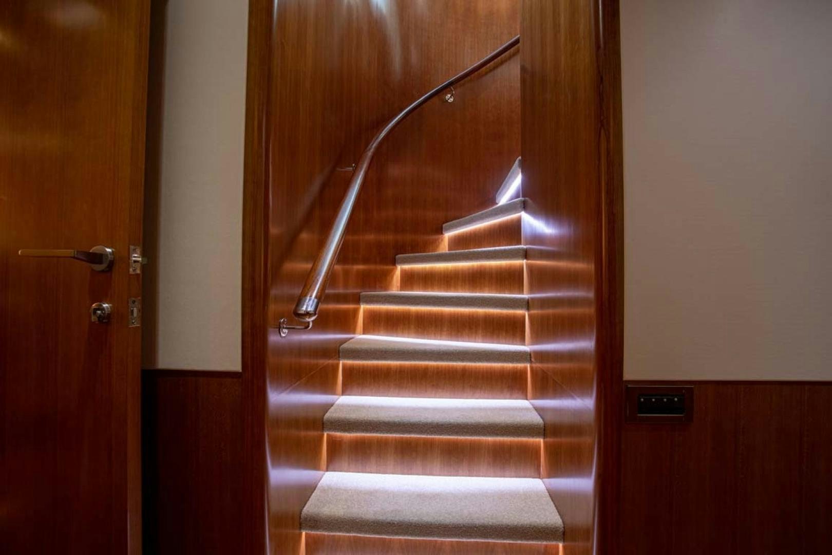a staircase with a door aboard LORETTA Yacht for Sale