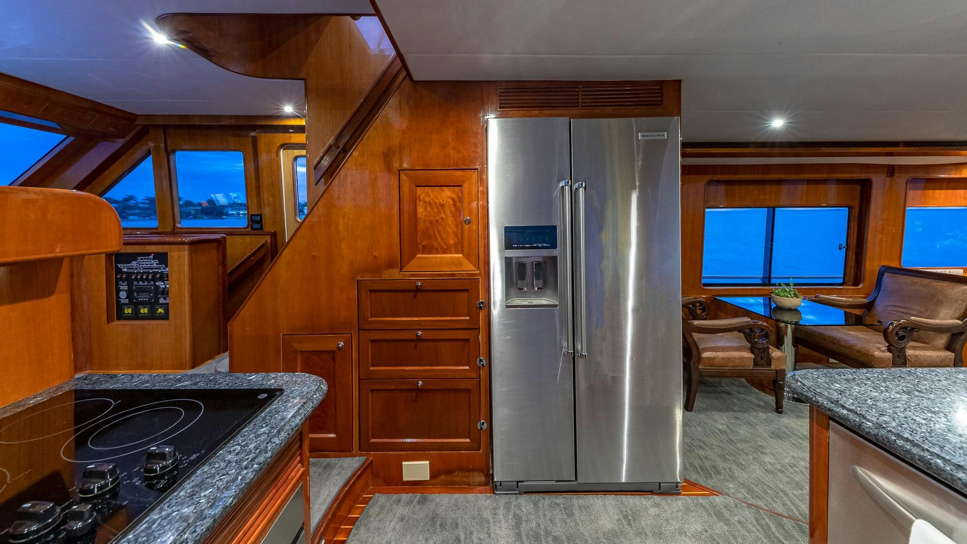 a living room with a large refrigerator aboard SAFARI Yacht for Sale