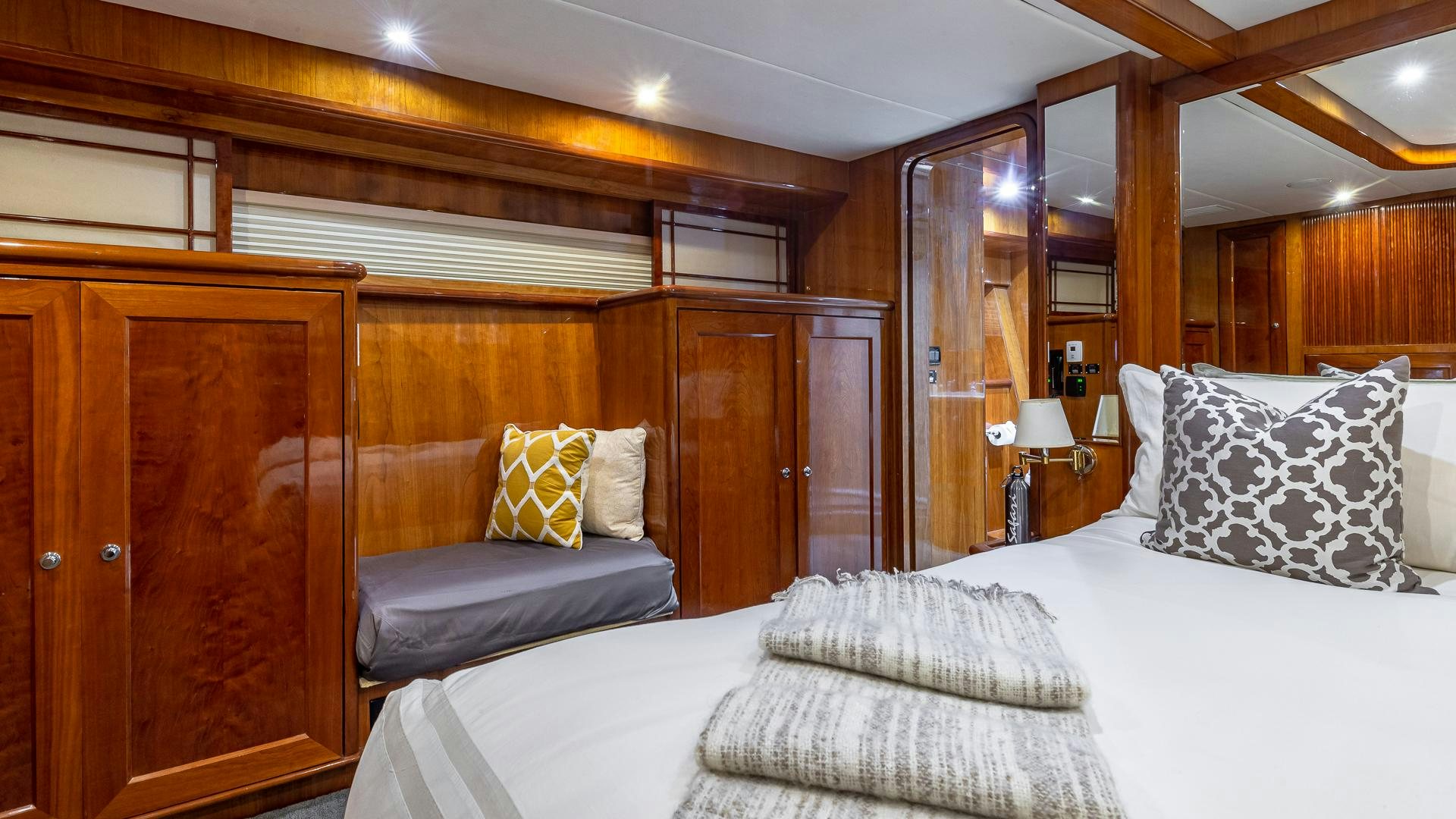 a bed in a room aboard SAFARI Yacht for Sale