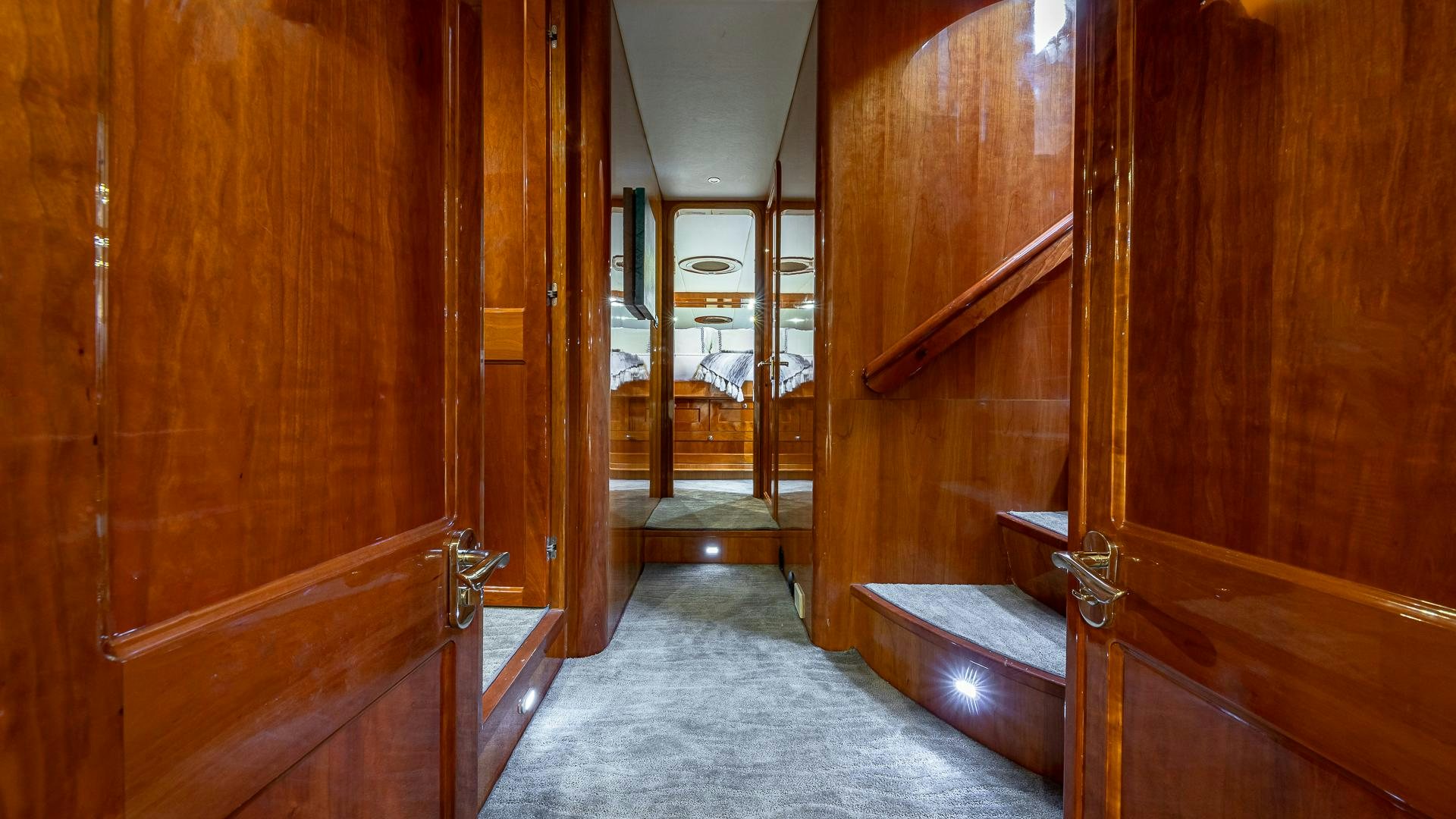 a hallway with wood walls aboard SAFARI Yacht for Sale