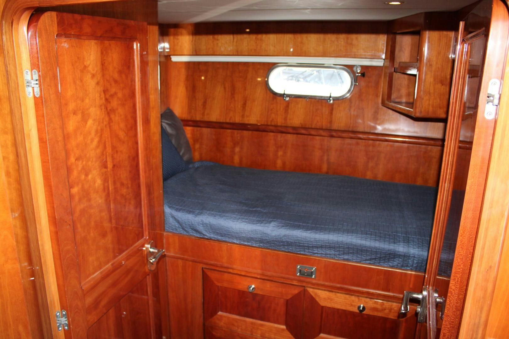 a bed in a room aboard SAFARI Yacht for Sale