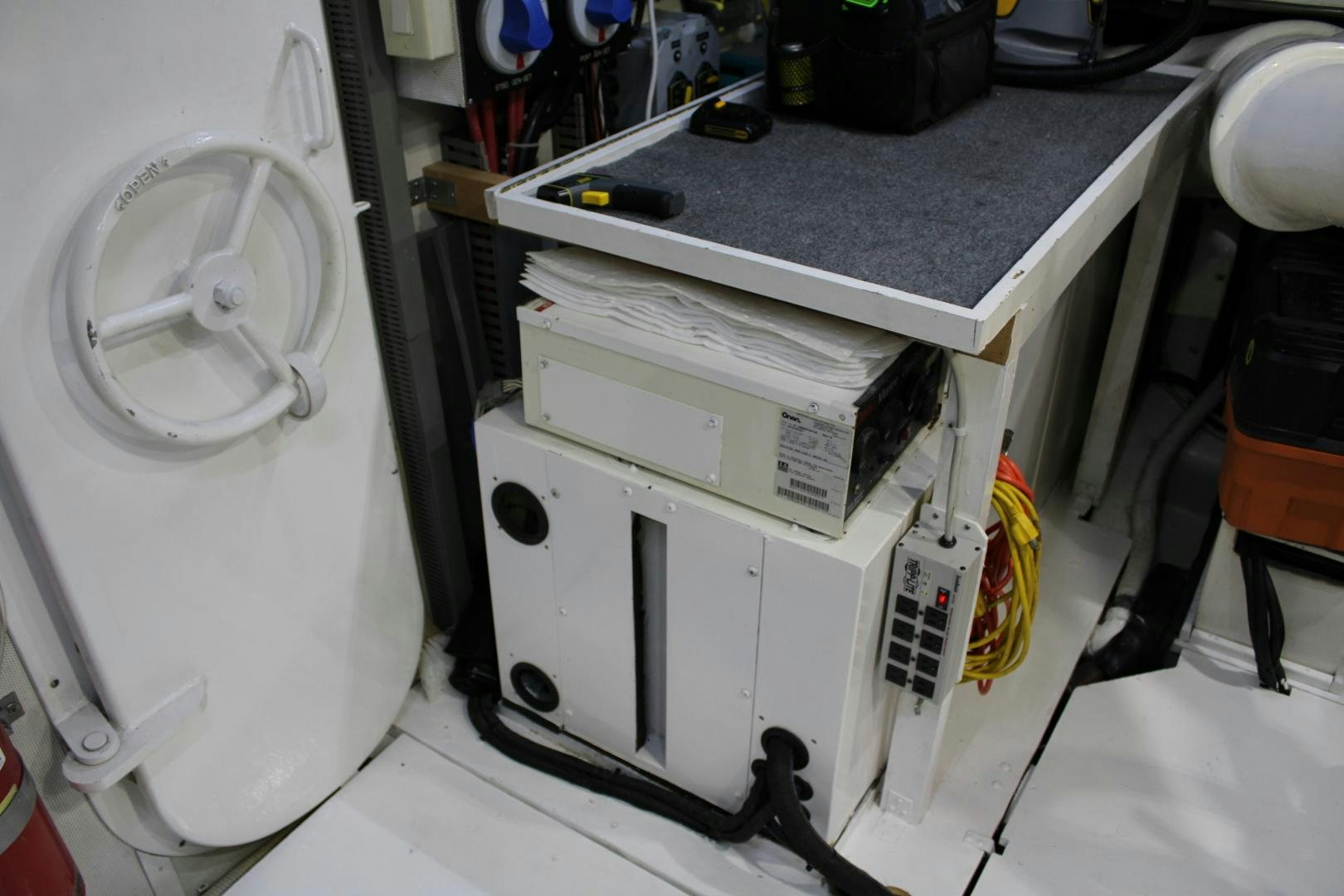 a white machine with a black cap aboard SAFARI Yacht for Sale