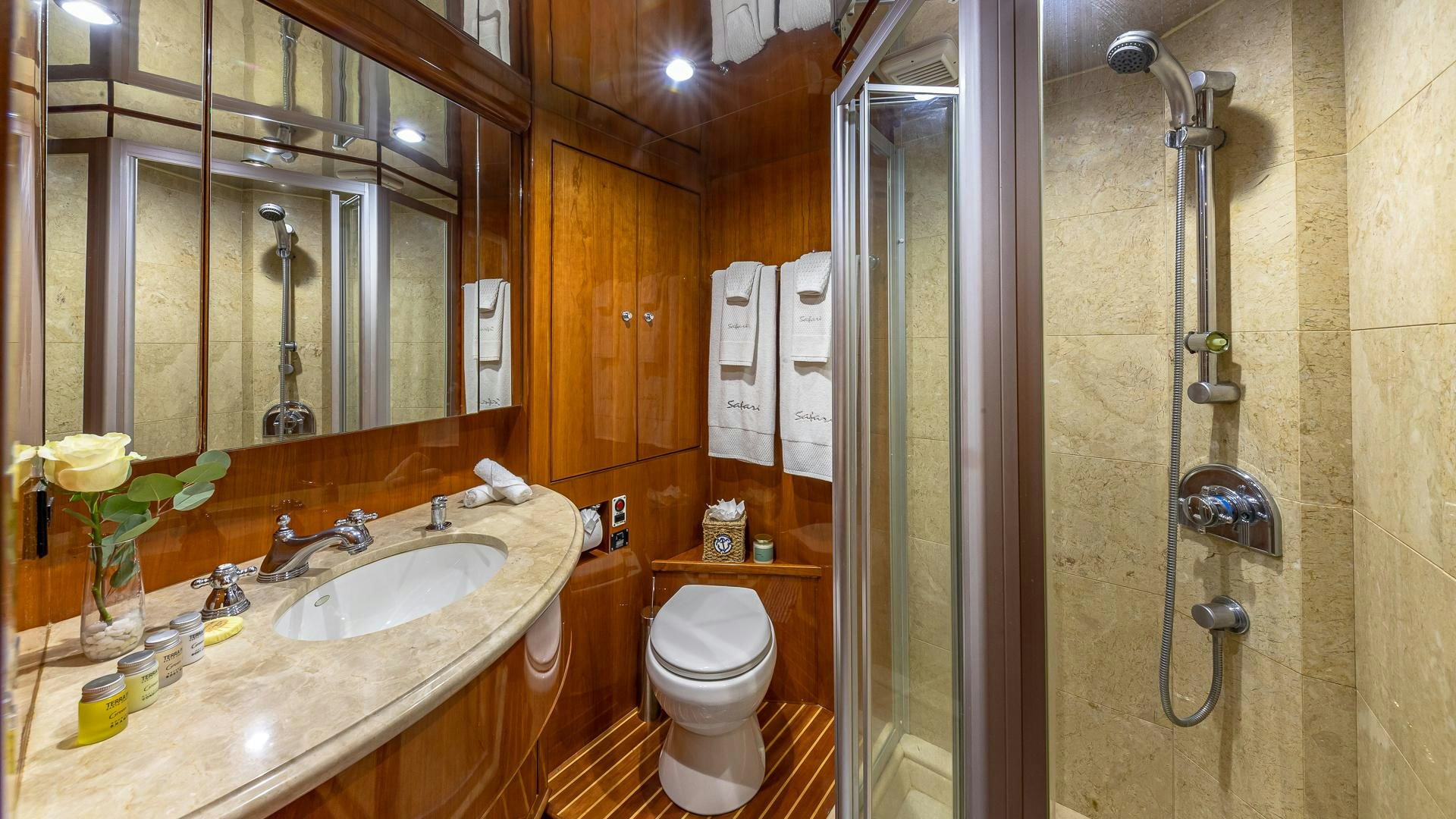 a bathroom with a sink and a toilet aboard SAFARI Yacht for Sale