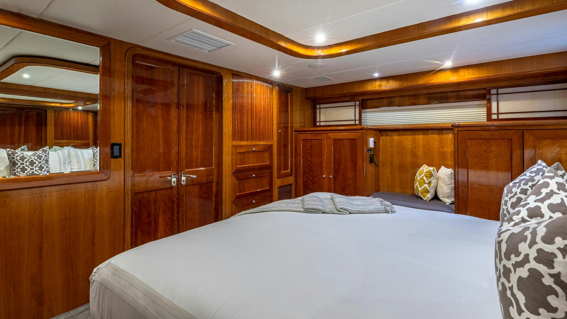 a bed in a room aboard SAFARI Yacht for Sale