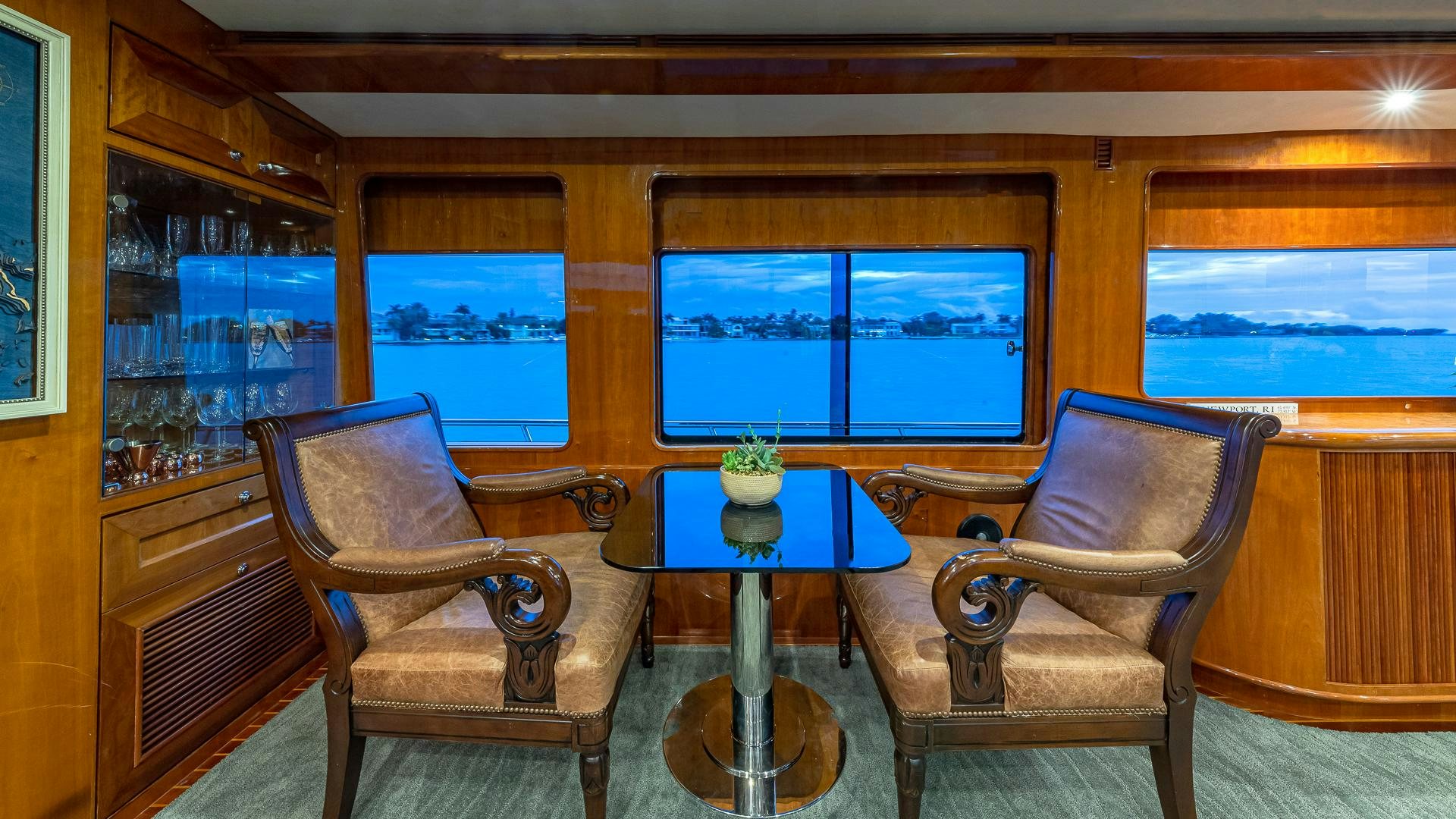 a couple of chairs in a room aboard SAFARI Yacht for Sale