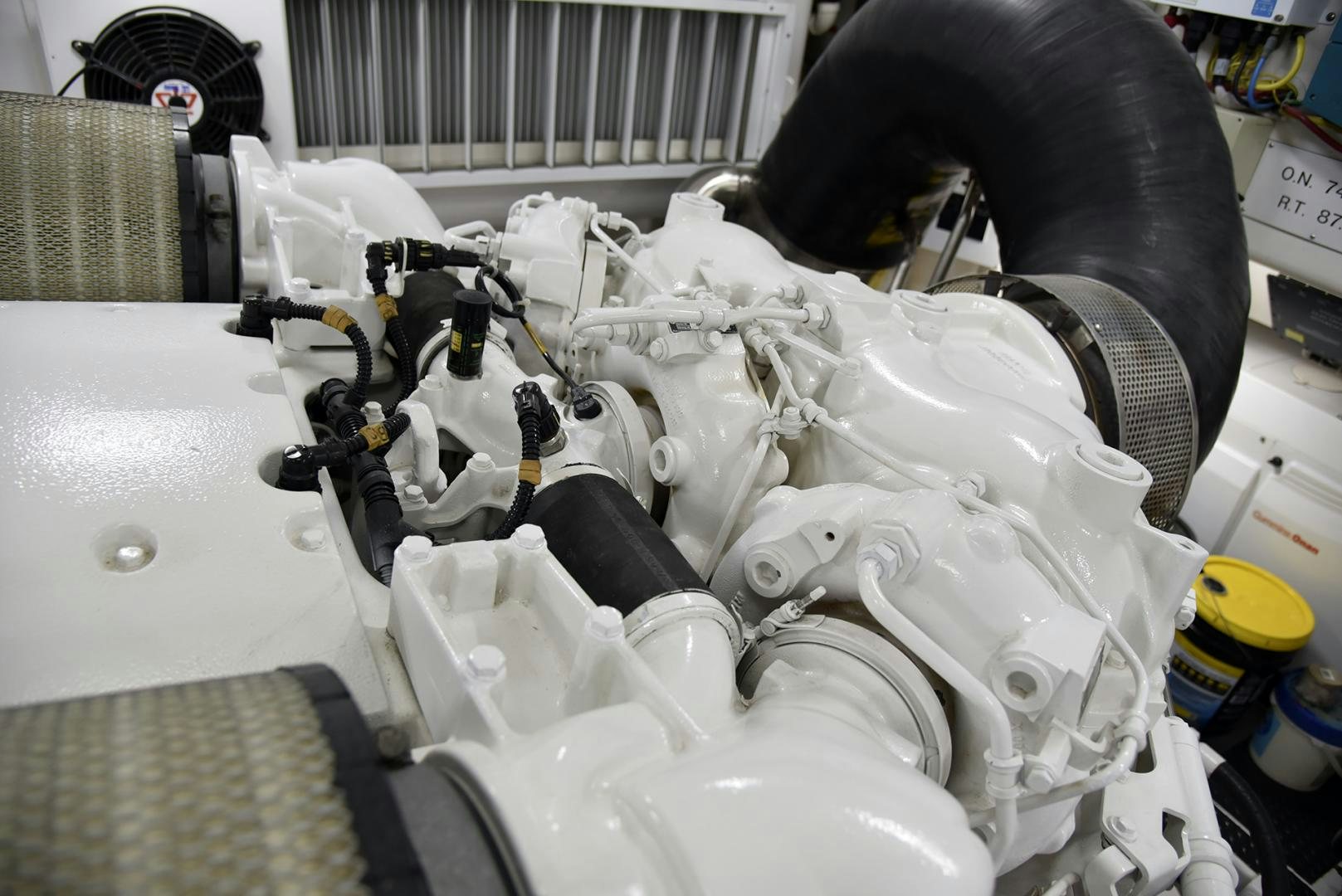 a car engine with a hood open aboard SALTY K Yacht for Sale
