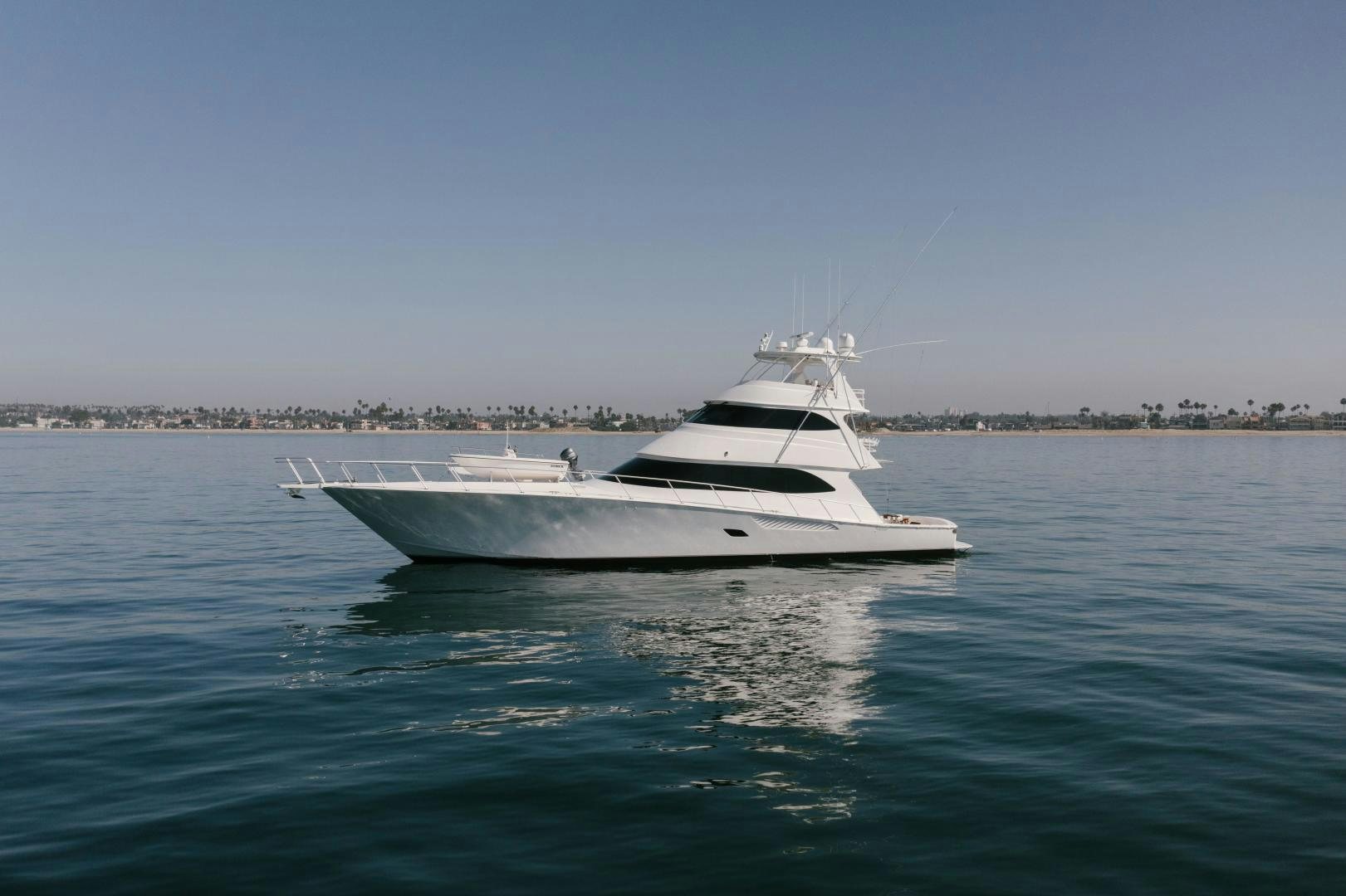 a white yacht in the water aboard SALTY K Yacht for Sale