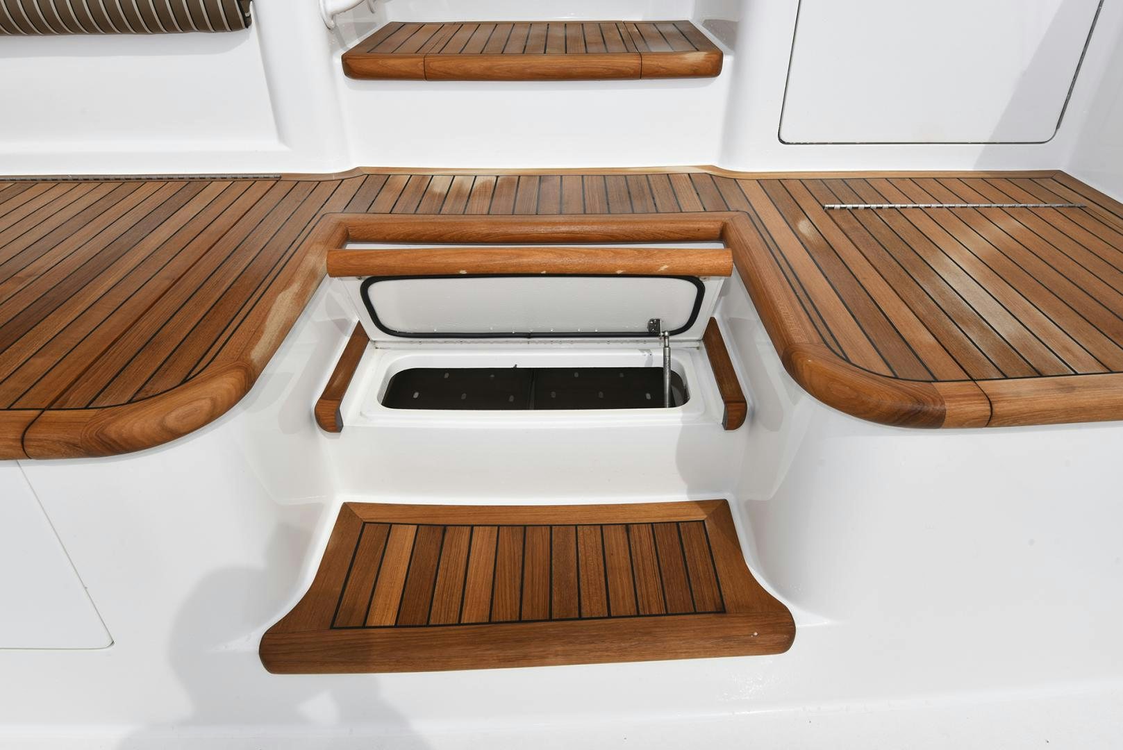 a white rectangular object with a wooden surface aboard SALTY K Yacht for Sale