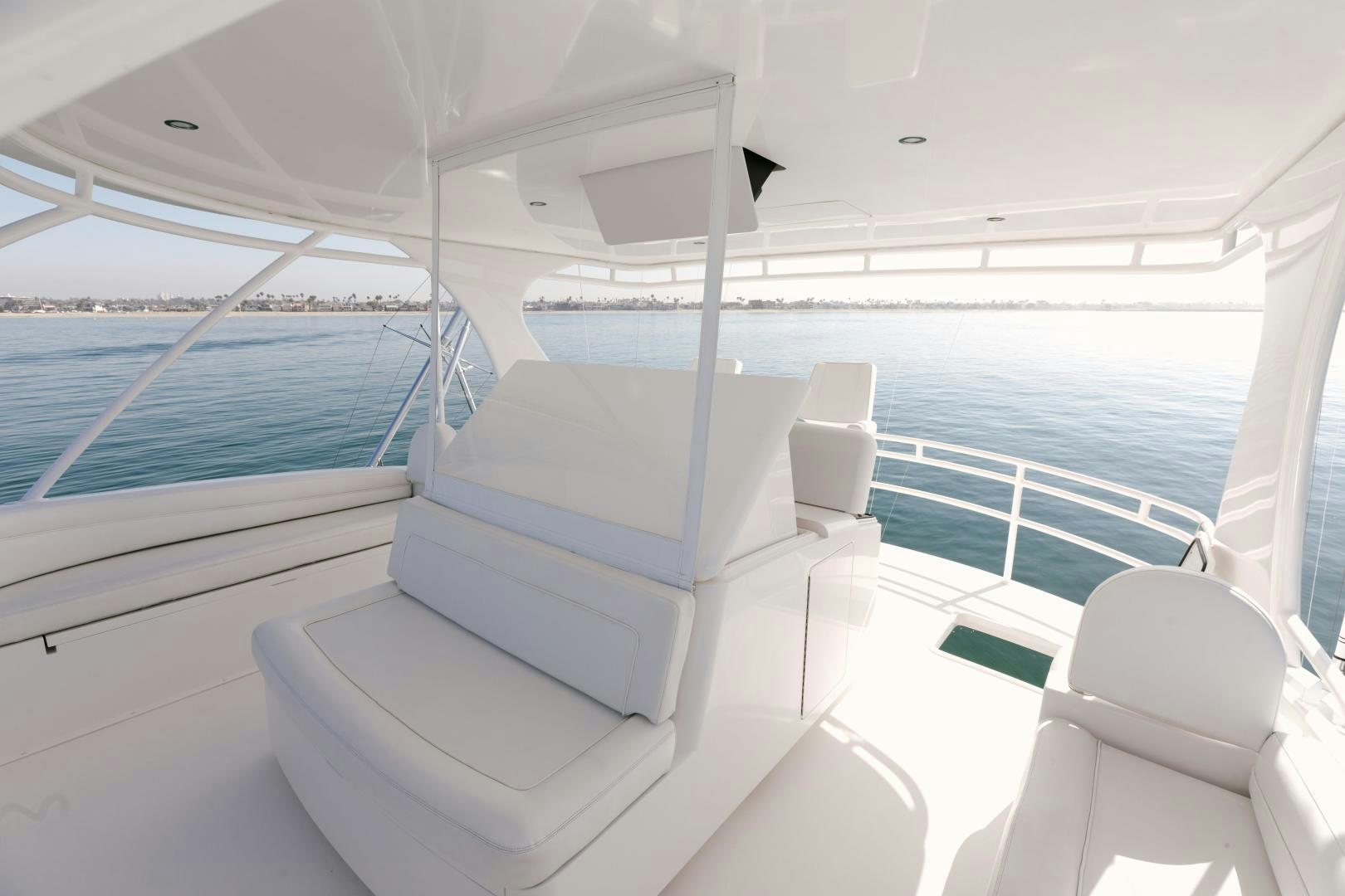 a white lounge chair on a boat aboard SALTY K Yacht for Sale