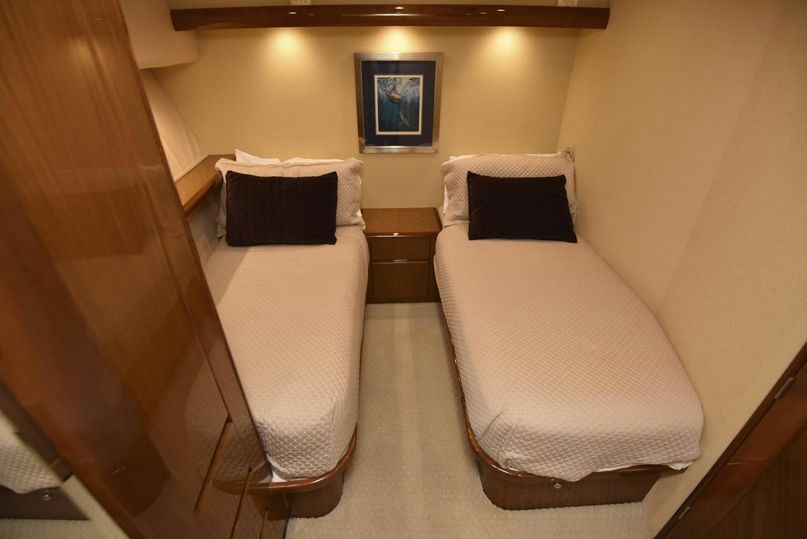 a couple of beds in a hotel room aboard SALTY K Yacht for Sale