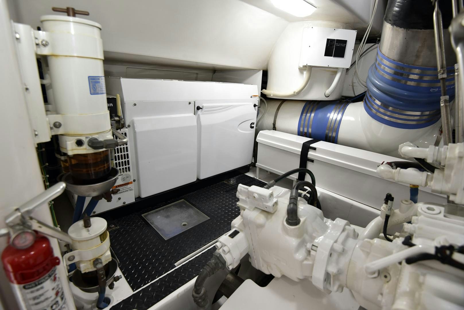 a room with several white machines aboard SALTY K Yacht for Sale