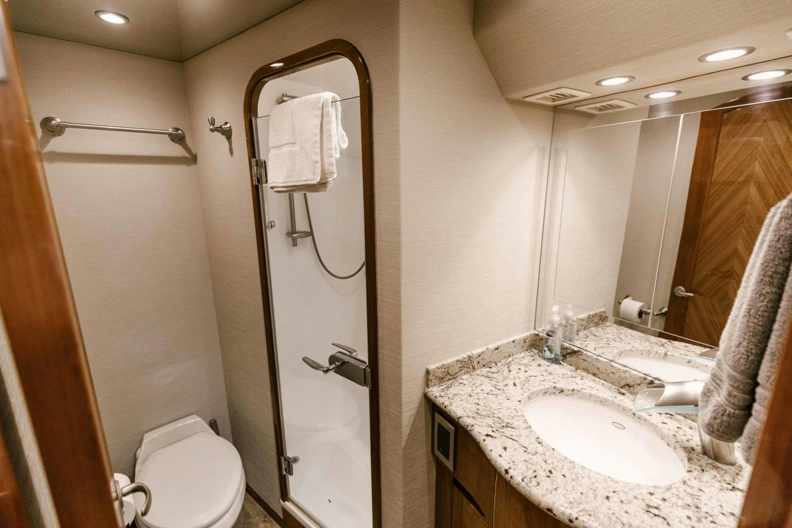 a bathroom with a sink and a toilet aboard SALTY K Yacht for Sale