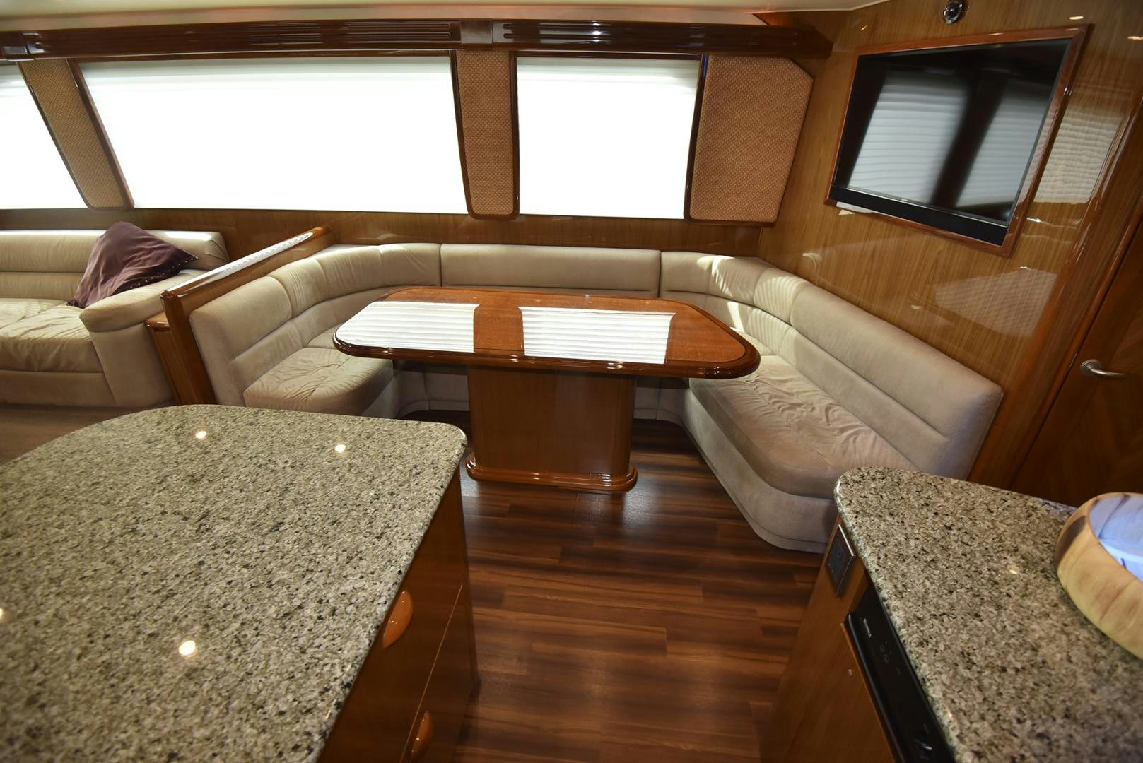 a room with a couch and a table aboard SALTY K Yacht for Sale