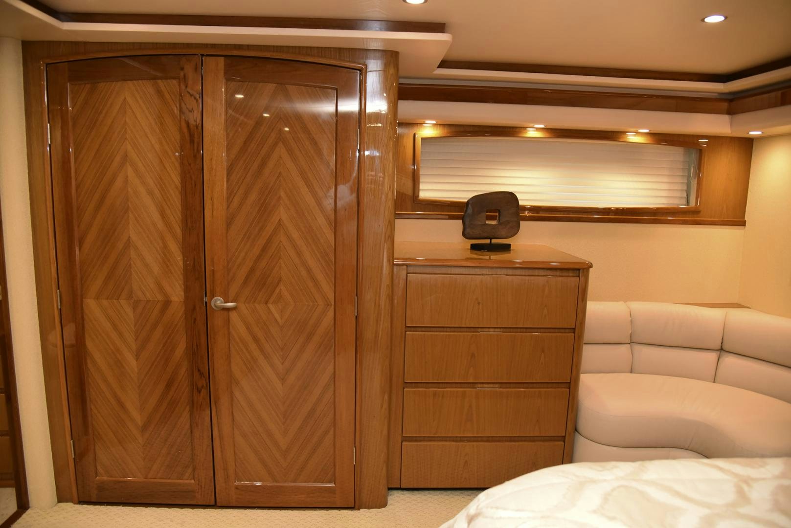 a room with a bed and a desk aboard SALTY K Yacht for Sale