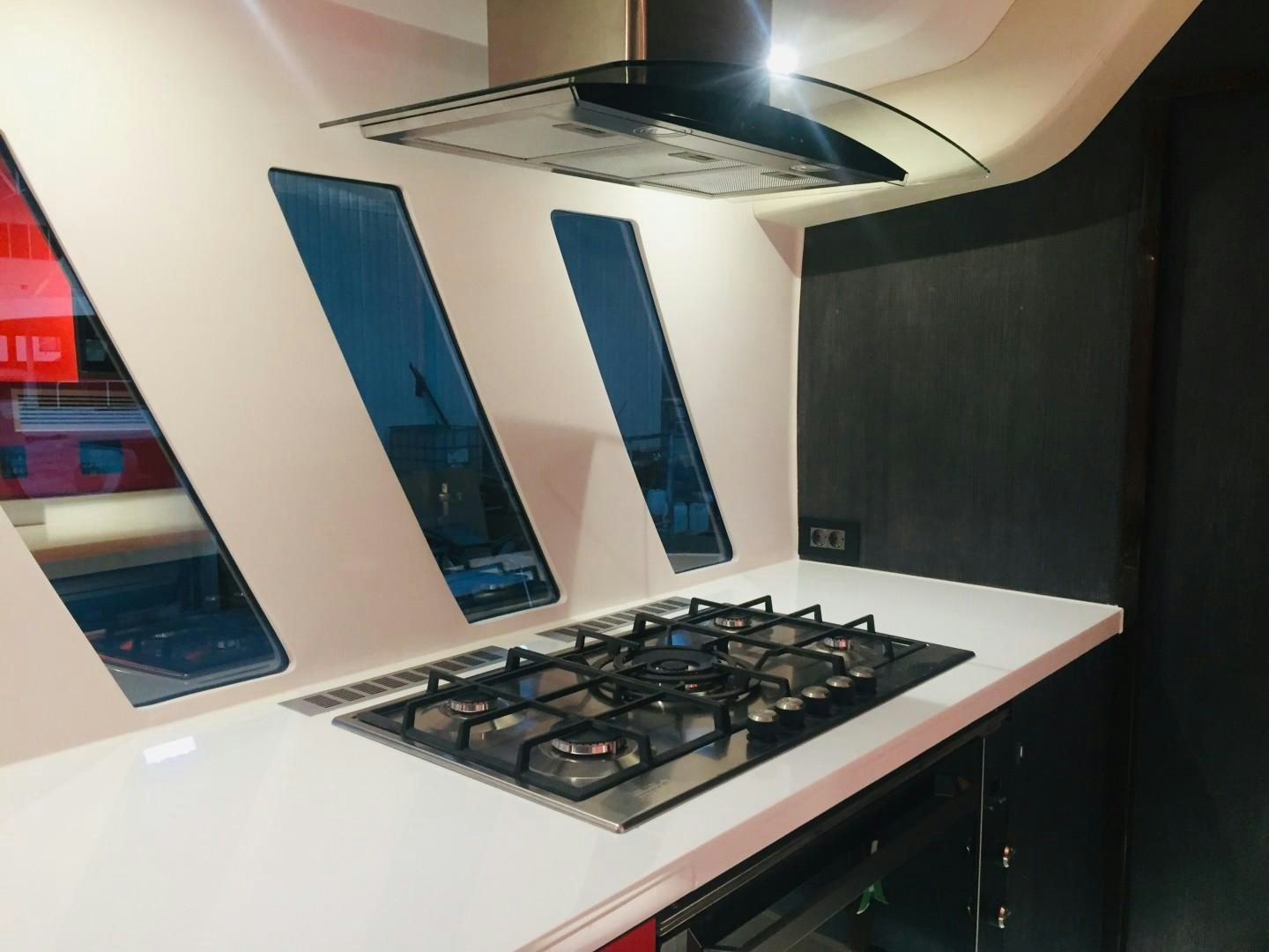 a black stove with a blue screen aboard SKYE Yacht for Sale
