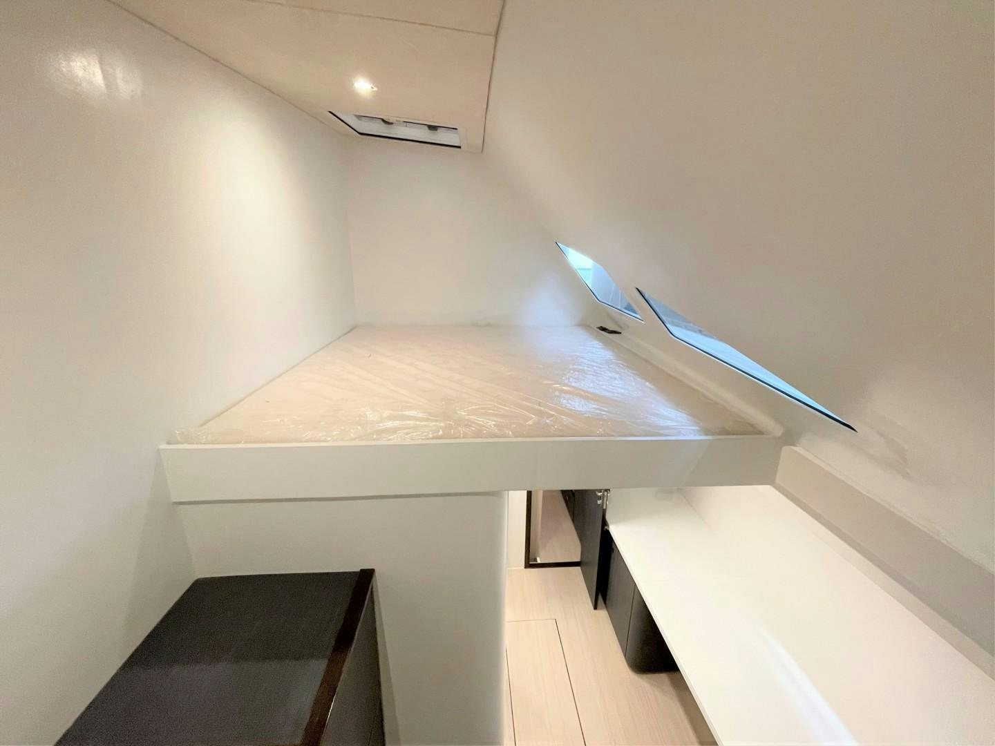 a table with a blue object on it aboard SKYE Yacht for Sale