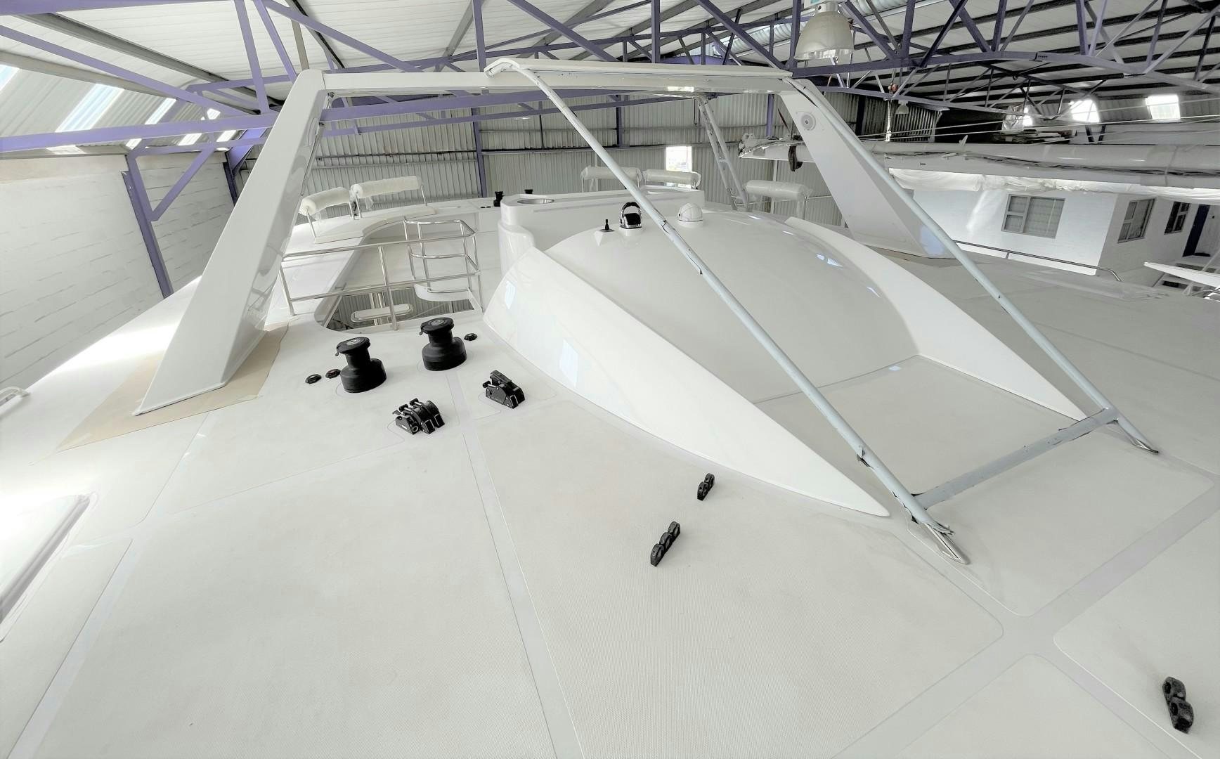 a large white room with a large white ceiling and a large white ceiling aboard SKYE Yacht for Sale