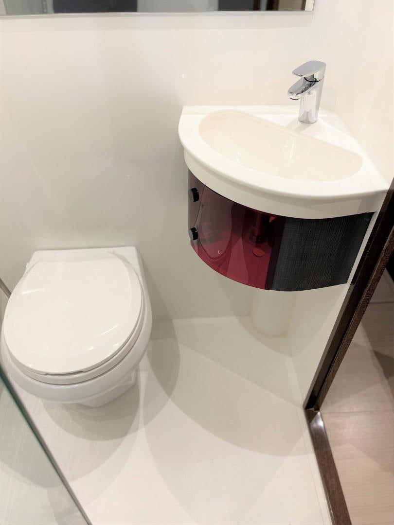 a sink and a toilet in a bathroom aboard SKYE Yacht for Sale