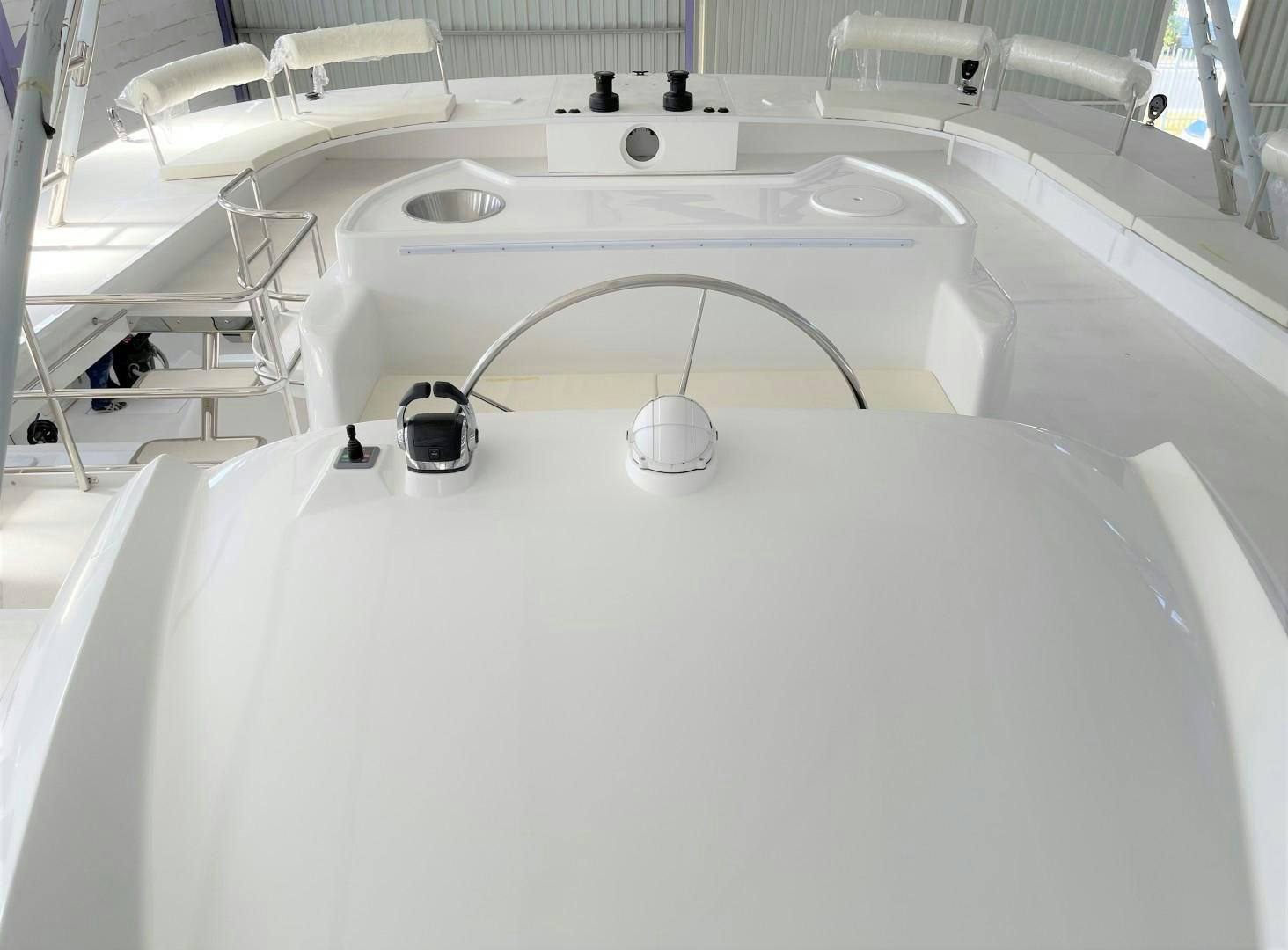 a white room with a round white object on a white surface aboard SKYE Yacht for Sale