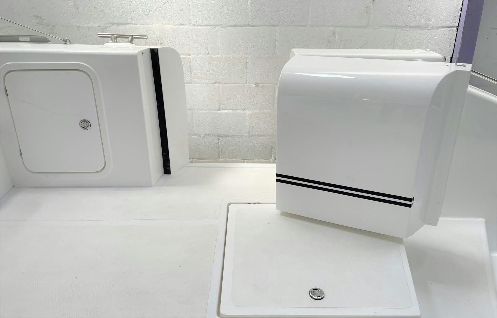 a group of white machines aboard SKYE Yacht for Sale