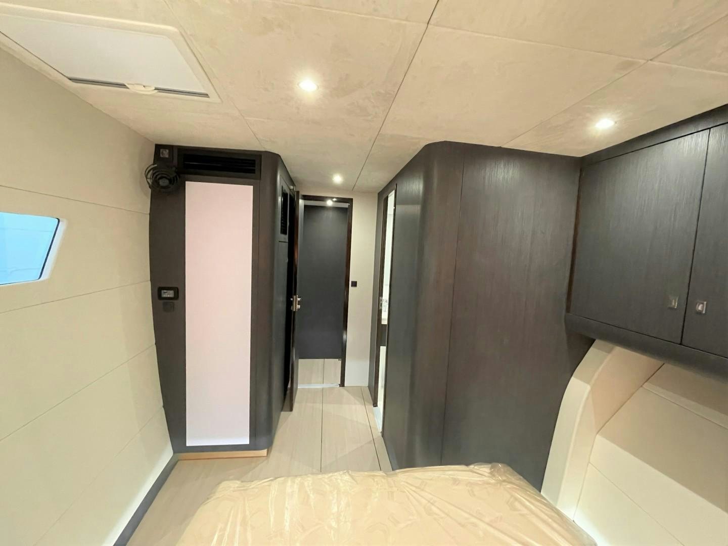 a room with a large closet aboard SKYE Yacht for Sale