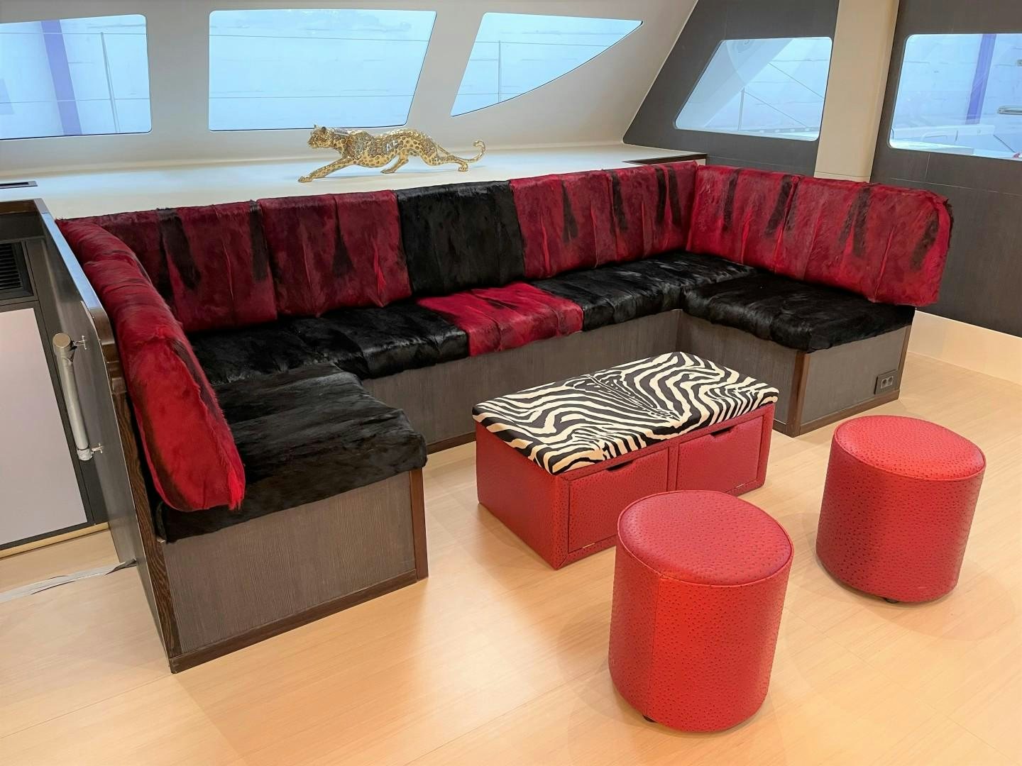 a living room with a couch and a table aboard SKYE Yacht for Sale