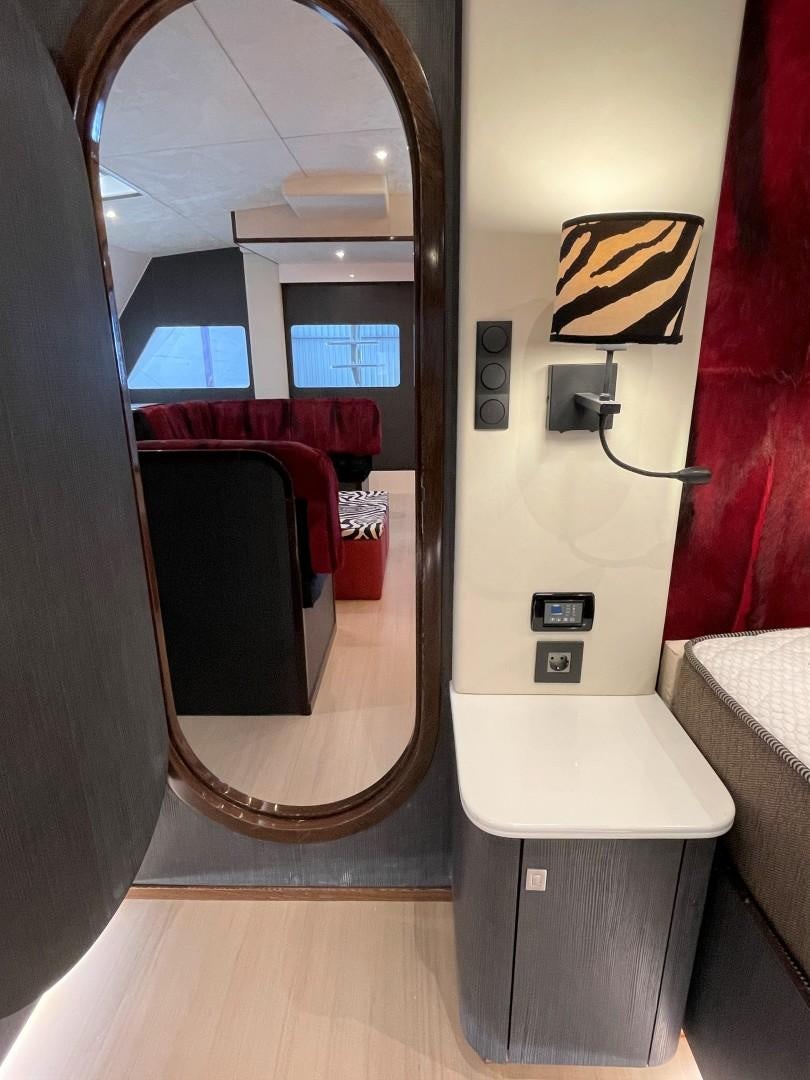 a bathroom with a mirror aboard SKYE Yacht for Sale