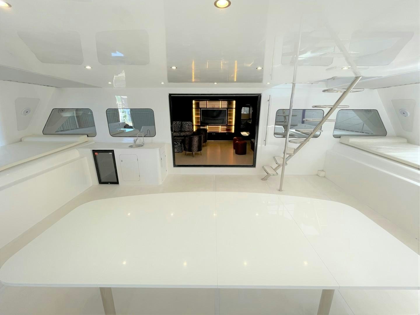 a room with a glass wall and a glass door aboard SKYE Yacht for Sale