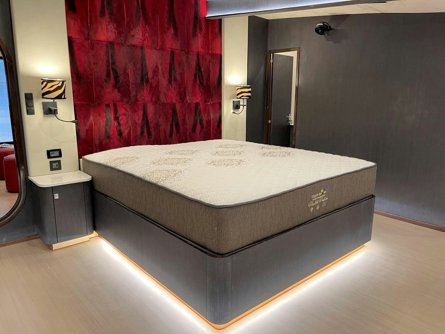 a bed in a room aboard SKYE Yacht for Sale
