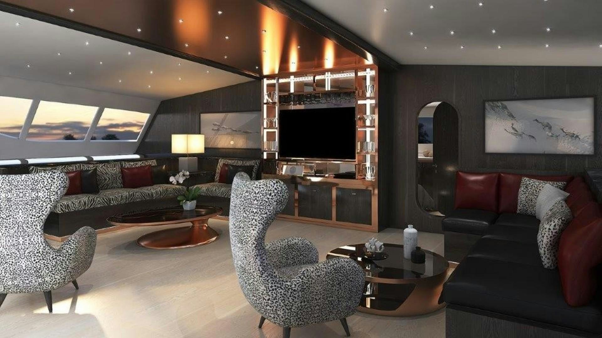 a living room with a large screen aboard SKYE Yacht for Sale