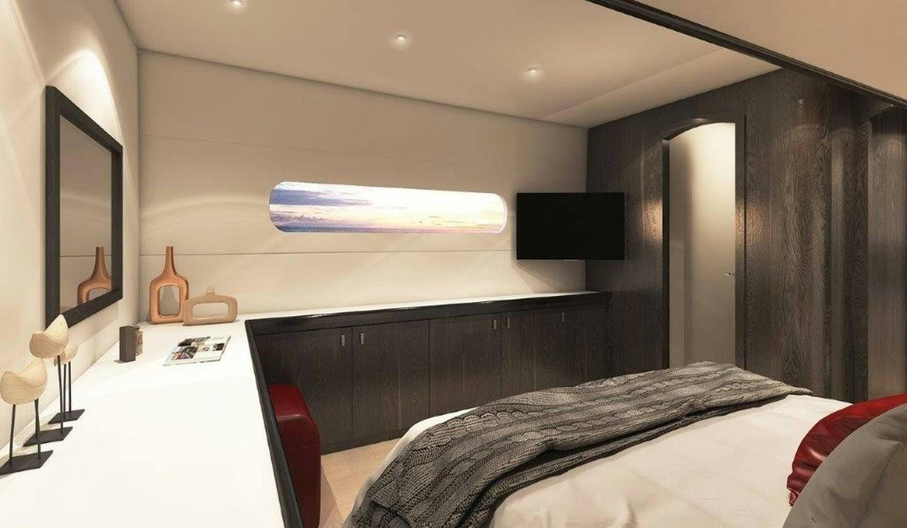 a bedroom with a bed and a tv on the wall aboard SKYE Yacht for Sale