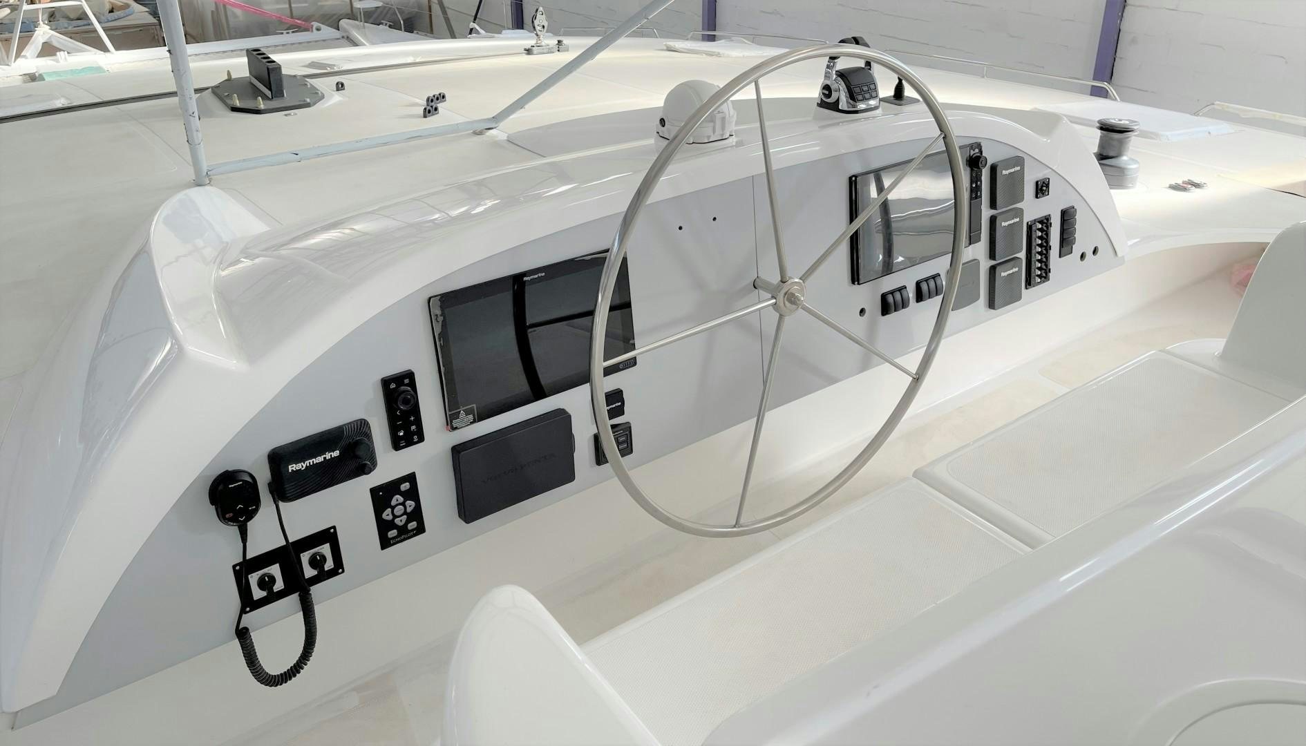 a white boat with black and white text on it aboard SKYE Yacht for Sale