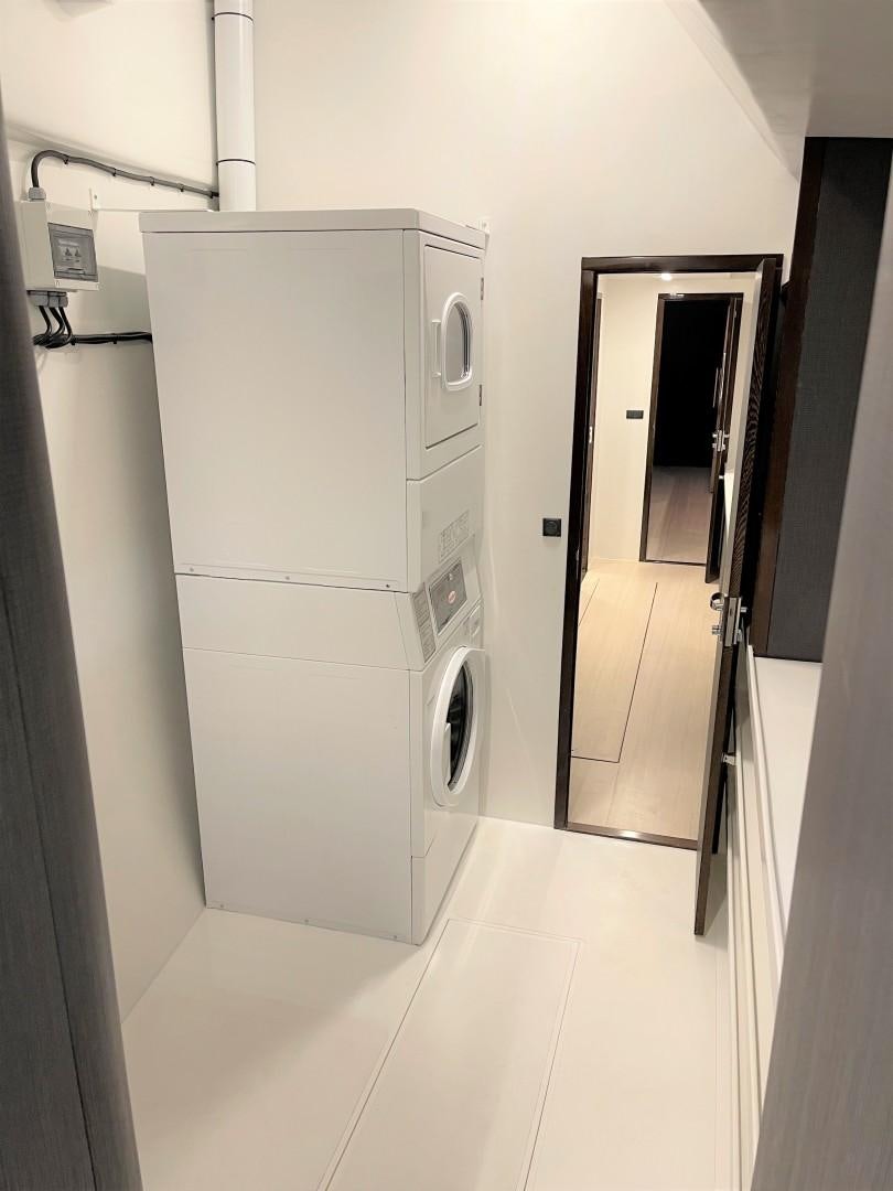 a room with a machine aboard SKYE Yacht for Sale