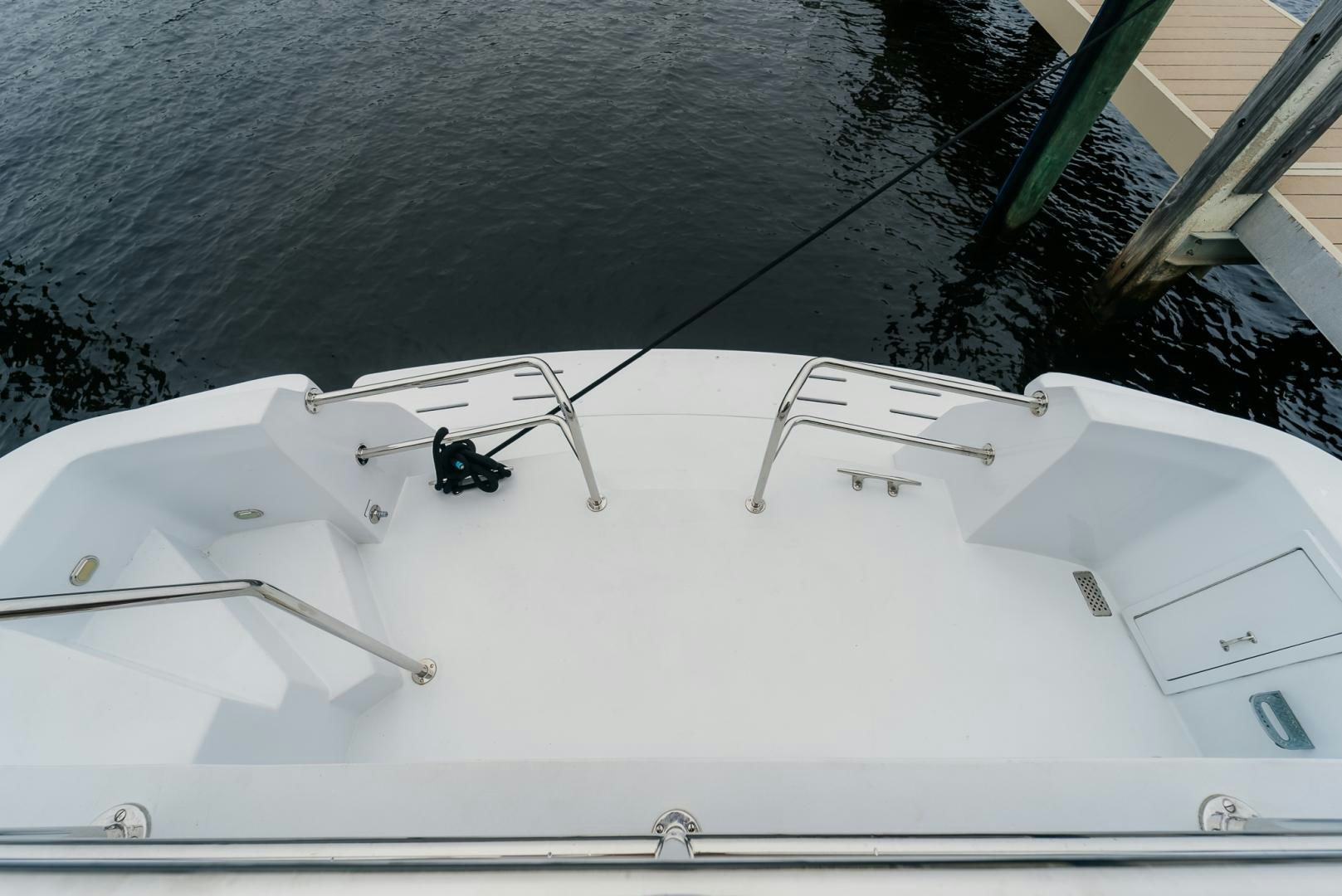 a white boat with a rope attached aboard Haggis XV Yacht for Sale