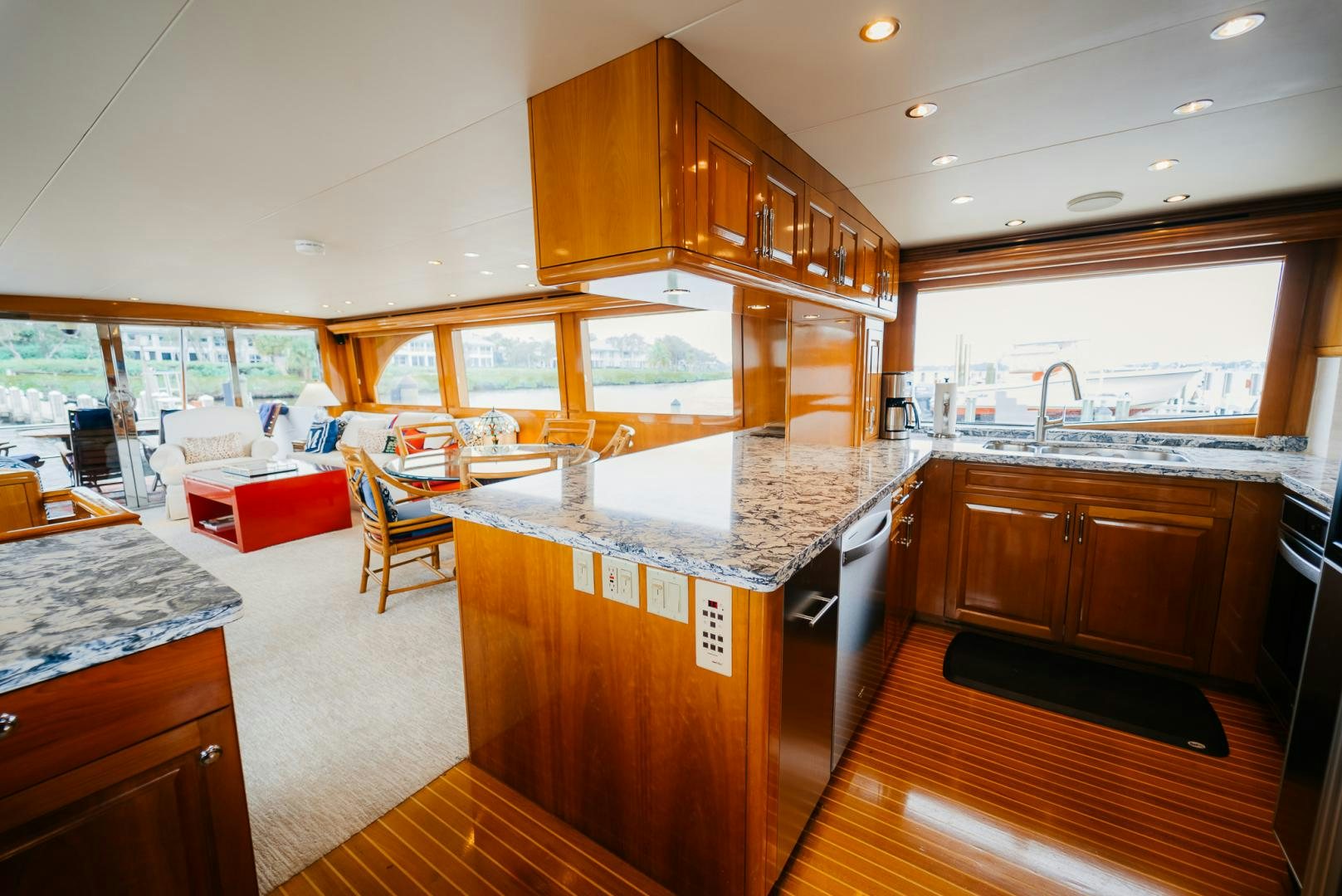 a kitchen with a large island aboard Haggis XV Yacht for Sale