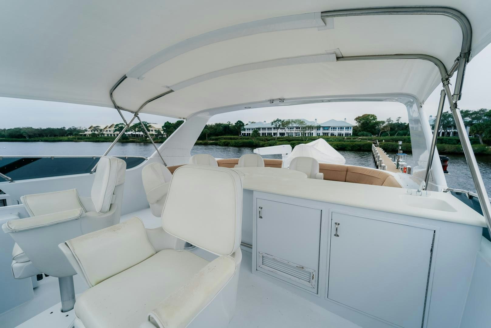 a boat with white furniture aboard Haggis XV Yacht for Sale