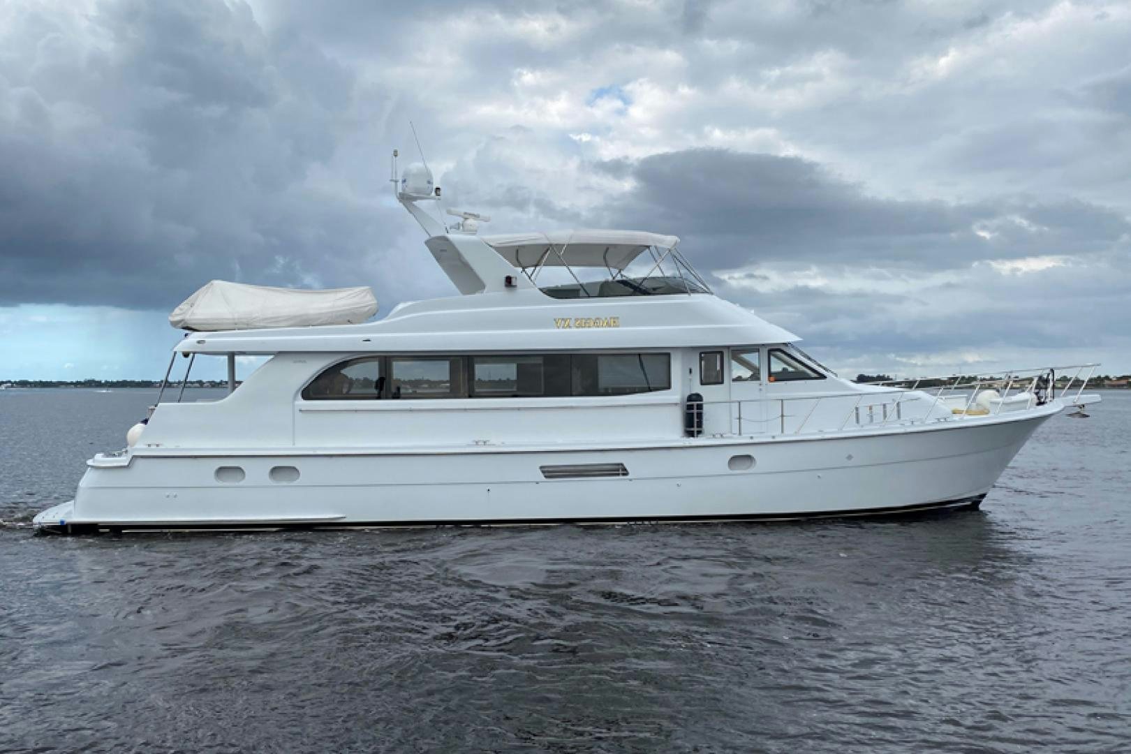 a white yacht on the water aboard Haggis XV Yacht for Sale